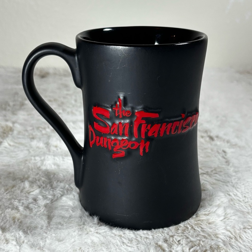 San Francisco Dungeon Souvenir Coffee Mug Black Red Raised Lettering 2014